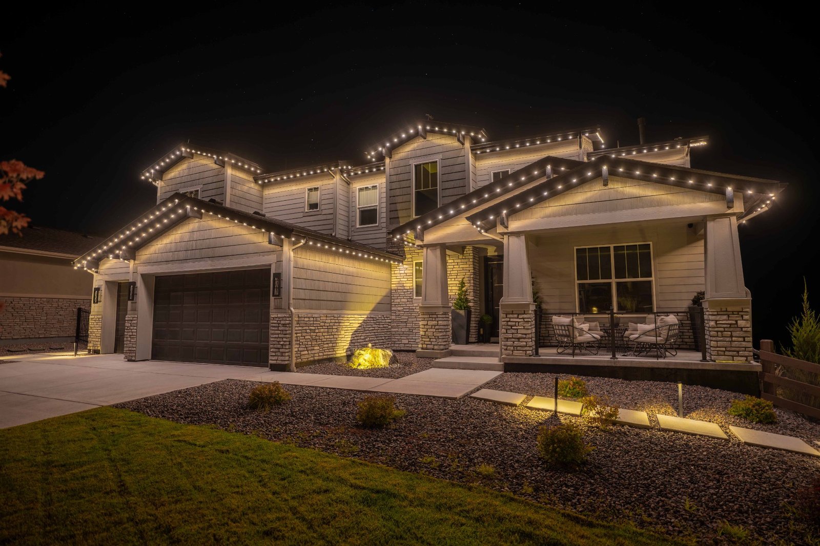 Permanent warm white exterior lighting Kansas home
