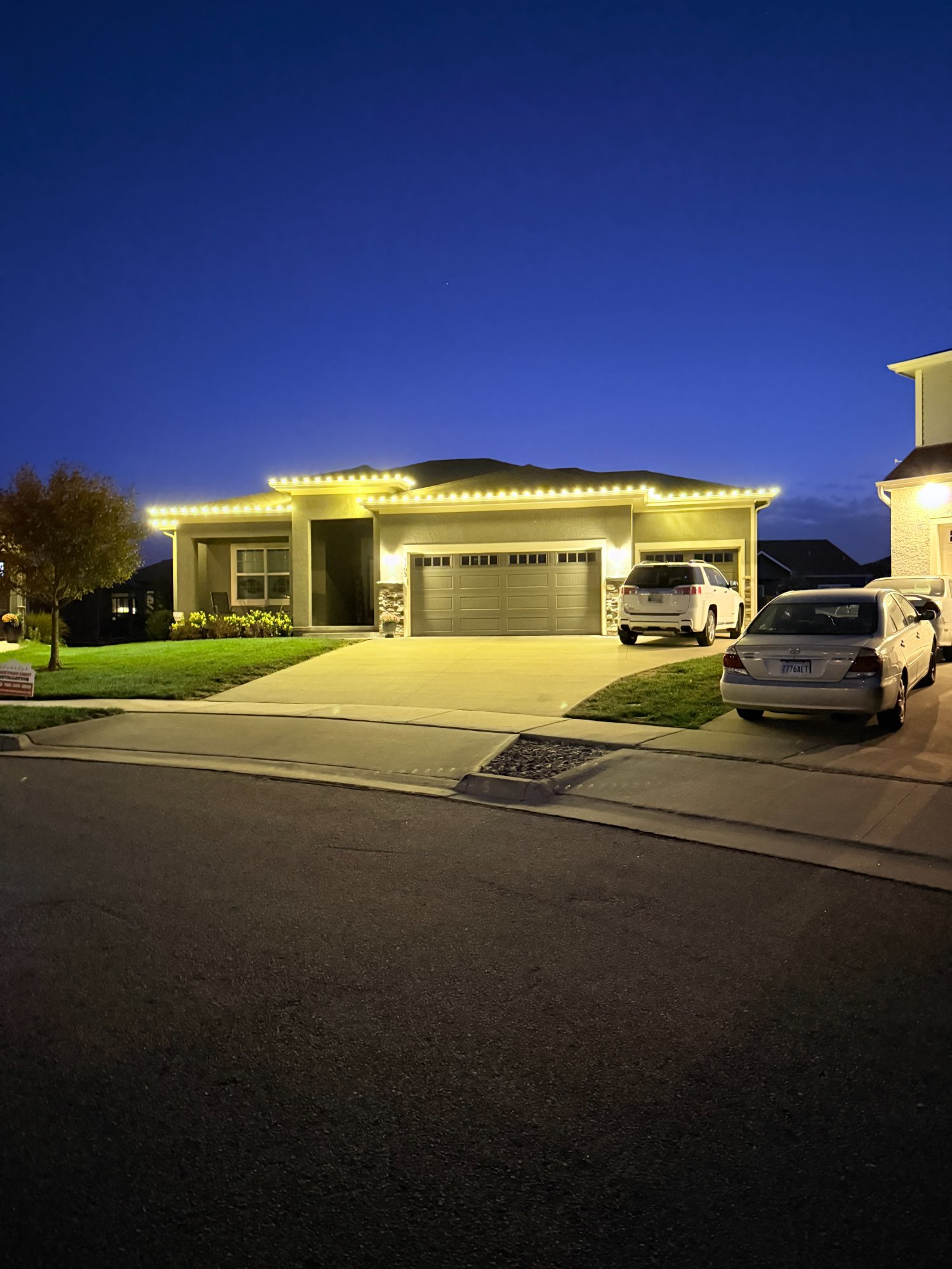 Warm white permanent lights Kansas home