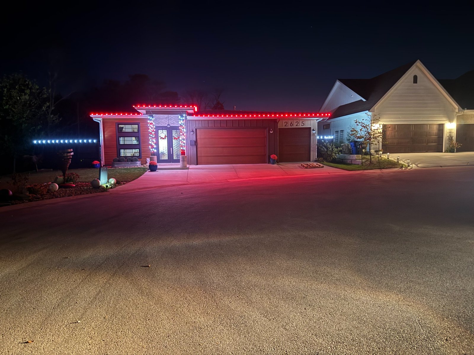 Red permanent lighting ranch home Kansas